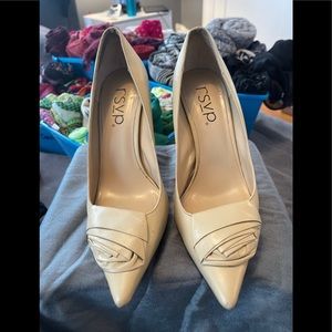 Cream high heeled shoes